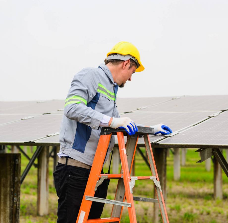 Professional engineer checking and maintaining solar panels on solar cell farm, Technician working on ecological solar farm, People with clean energy technology, Renewable energy, Solar power plant station