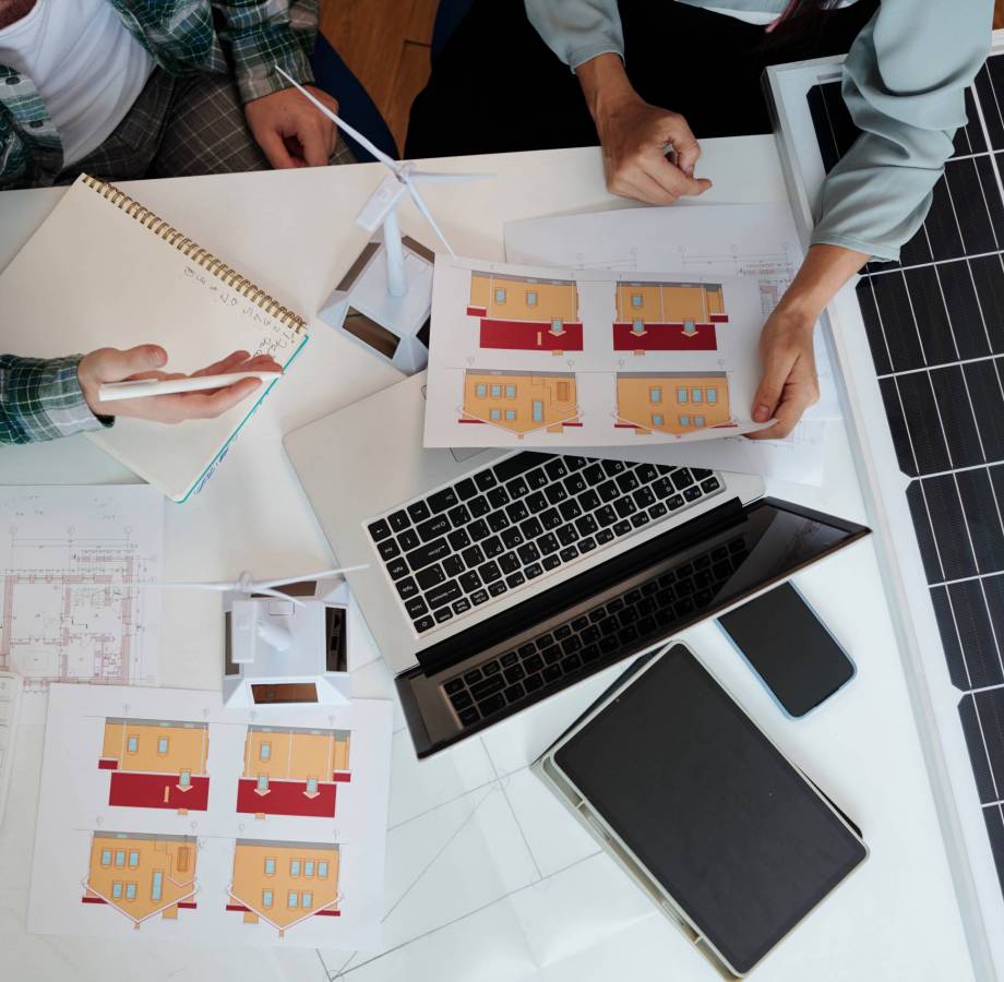 Engineer and project manager discussing better way to supply house with solar energy